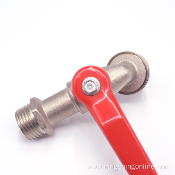Brass faucet with red handle